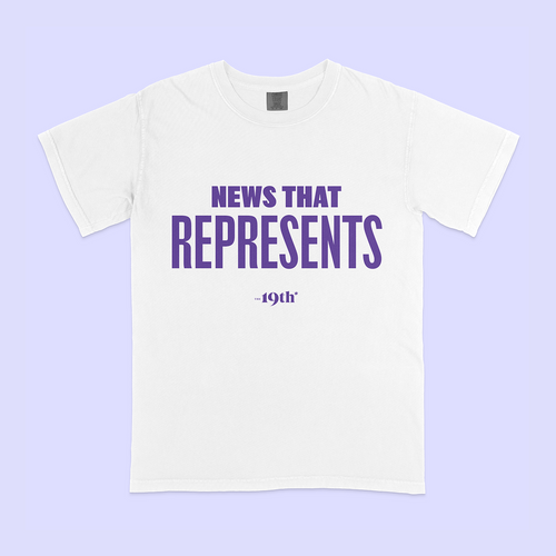 A white short-sleeve crewneck t-shirt with purple text reading 'News That Represents, The 19th*' printed on the front, displayed flat against a light lavender background.